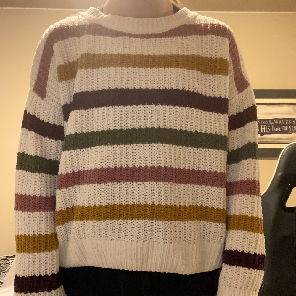 Cream with gold dark purple olive green and a mauv pink for the stripes